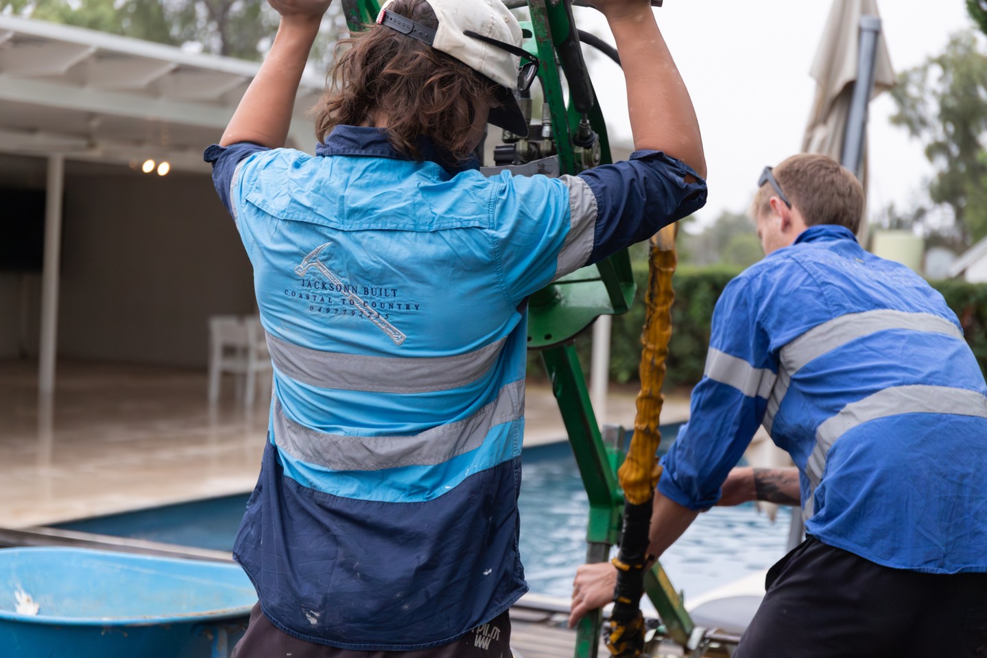 Crew on site during pool pavilion build